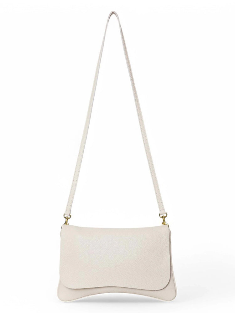 Off-white leather crossbody bag with long strap and gold clasps.