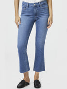 Here's alt text under 125 characters:

Mid-wash blue cropped flare jeans, raw hem.  Model wears black loafers.