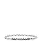 Silver round beaded bracelet with a central segment of darker, faceted hema beads.