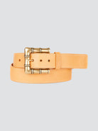 Beige leather belt with gold bamboo-shaped buckle.