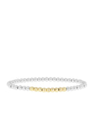 Two-tone beaded bracelet: smooth silver beads, textured gold beads in center.