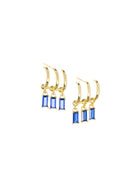 Pair of gold-toned stud earrings. Each has three small attached hoops, each with a dangling rectangular blue stone.