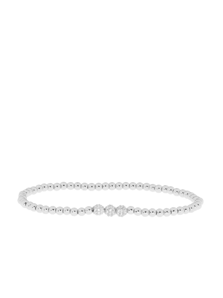 Silver beaded bracelet with three central sparkling silver-toned beads.