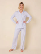 Light blue and white striped long-sleeve pajama shirt and pants with white piping and buttons.