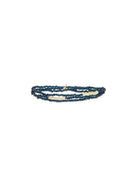 Dark blue crystal wrap bracelet with gold-tone rectangular beads.