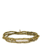 Multi-strand dark gold faceted bead bracelet with a central elongated cream pearl.