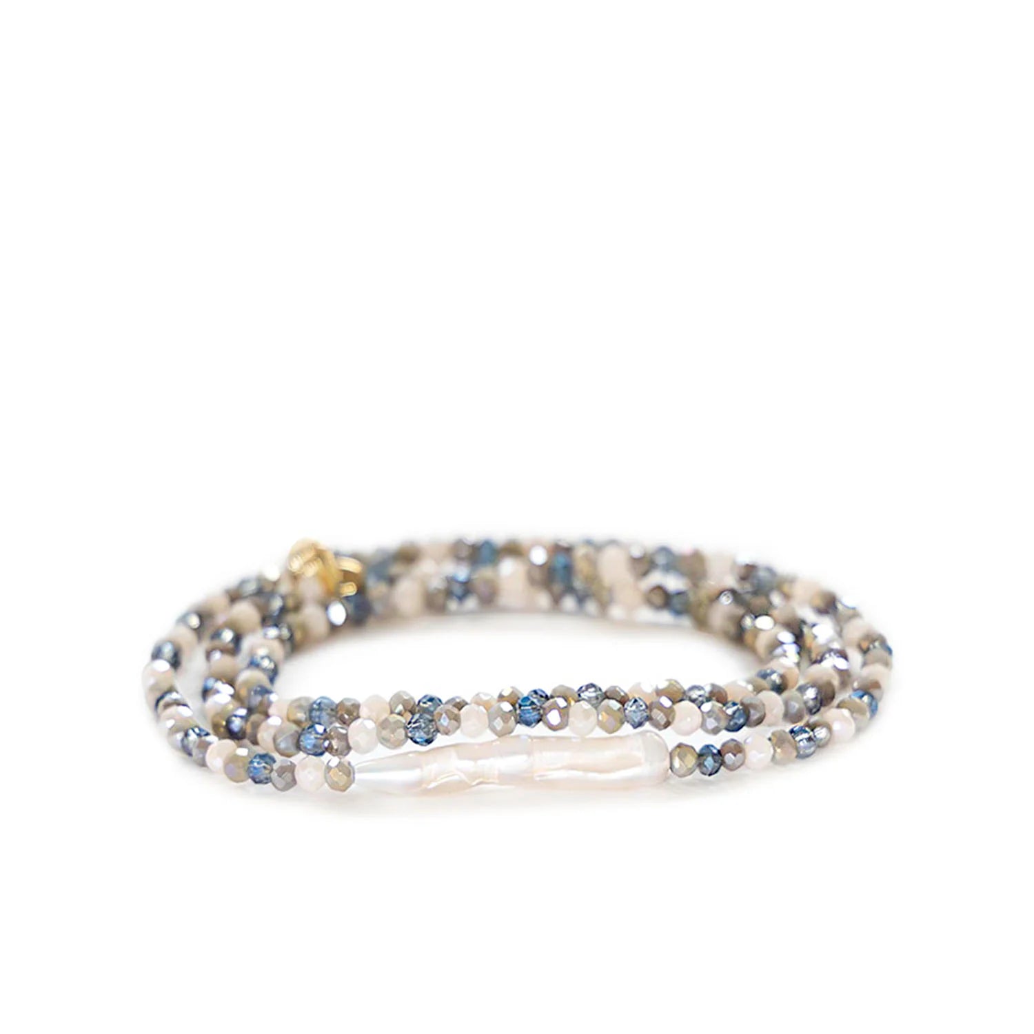 Stretch bracelet coiled, with iridescent blue, grey, cream faceted beads, and a long white baroque pearl.