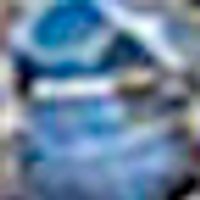 Swirling blues from deep sapphire to light periwinkle, with white marbling. Abstract, fluid appea...