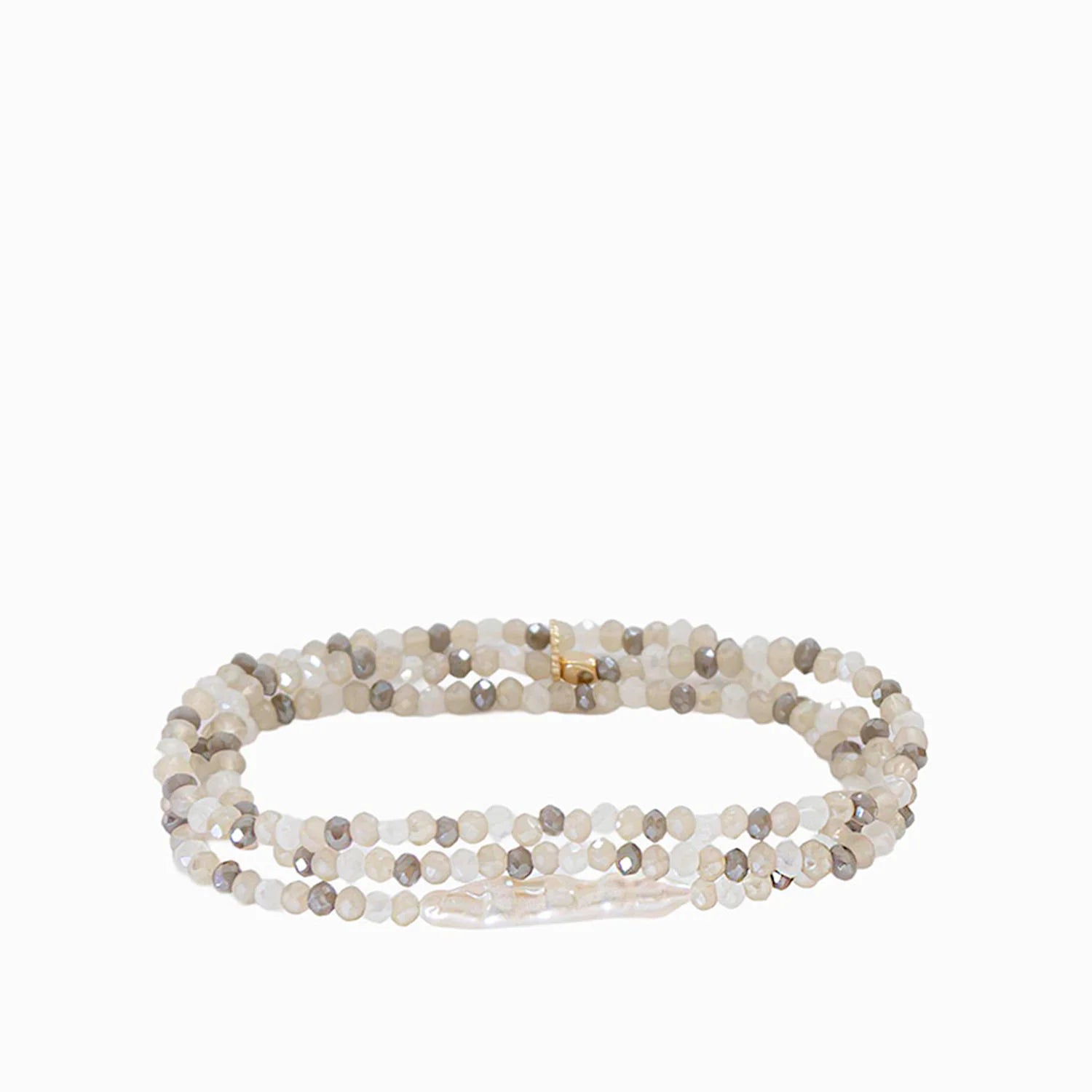 Multi-strand stretch bracelet of small white, beige, & gray faceted beads, with an irregular white pearl & gold clasp.