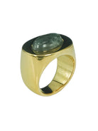 Gold-tone wide ring with a smooth, oval grey-green stone.