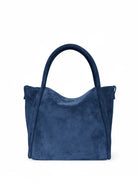 Dark blue suede satchel bag with two top handles.