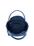 Dark blue suede satchel; top view showing interior.  Gold zipper and handles.