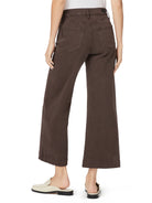Back view of dark brown wide-leg cropped jeans. Features belt loops and two patch pockets.