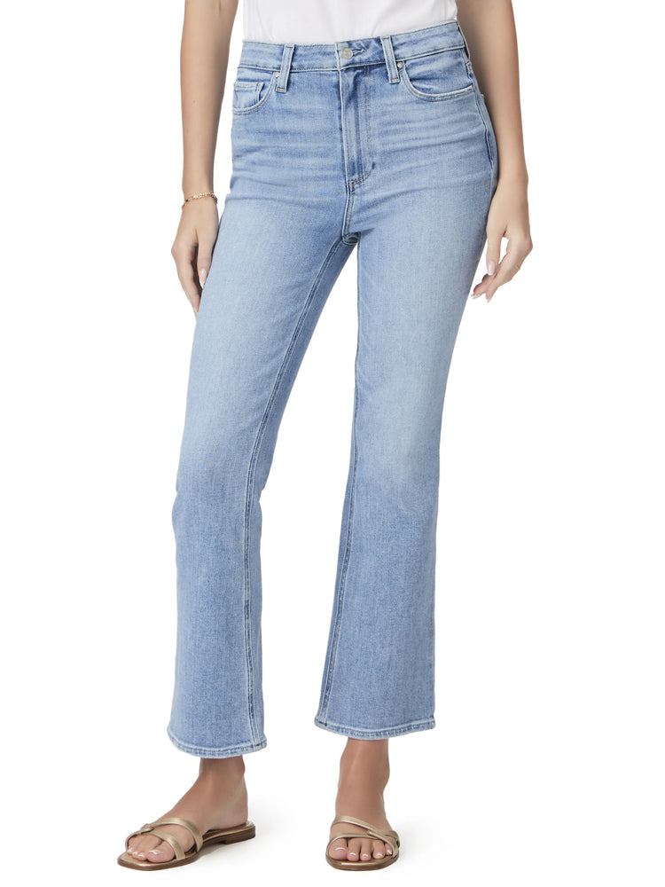 Light wash, ankle-flare jeans.  High-waisted, with slight bell bottom. Model wears gold sandals.