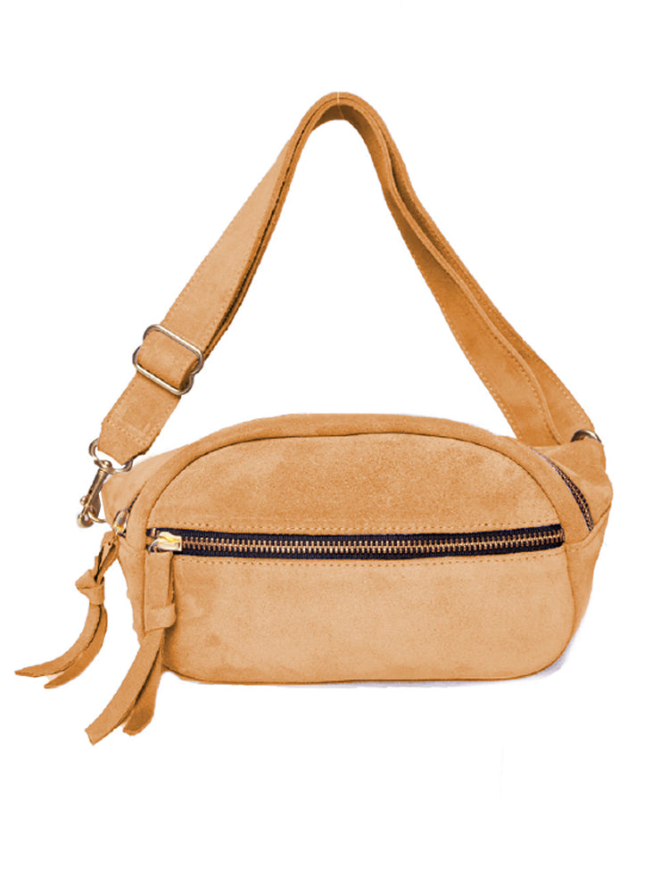 Tan suede waist bag with gold zippers, adjustable strap, and small tassels.