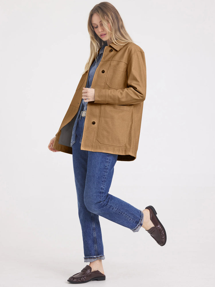 Tan Harper Jacket with a collar, dark brown buttons, two chest flap pockets, and two large lower patch pockets.