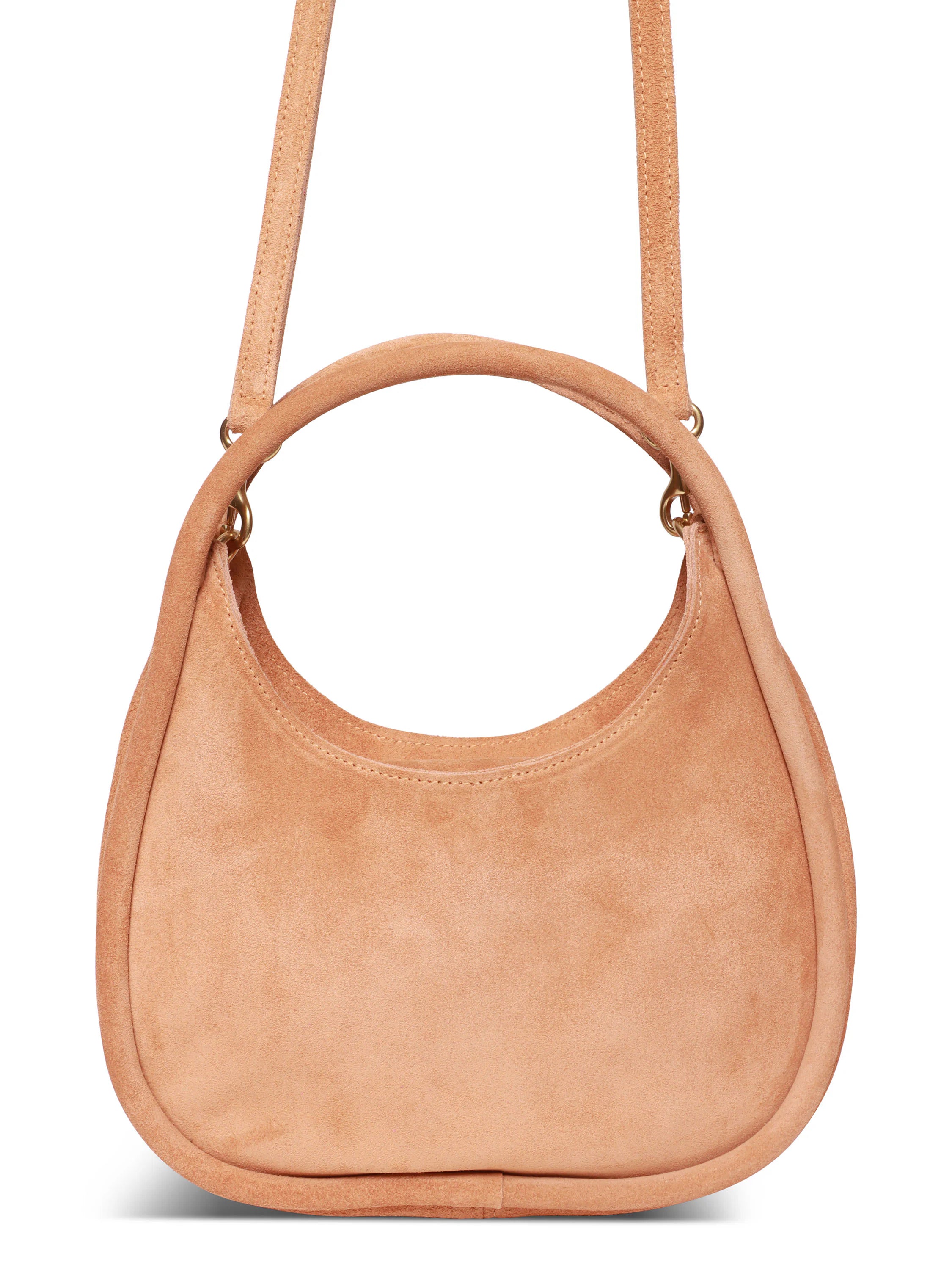 Light beige suede crossbody bag with a circular top handle and thin shoulder strap.  Gold-toned hardware.