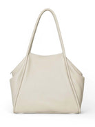 Off-white tote bag with two shoulder straps.  Structured, slightly curved shape.  Textured, possibly leather-like material.