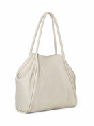 Off-white tote bag with double handles.  Textured, slightly slouchy design.