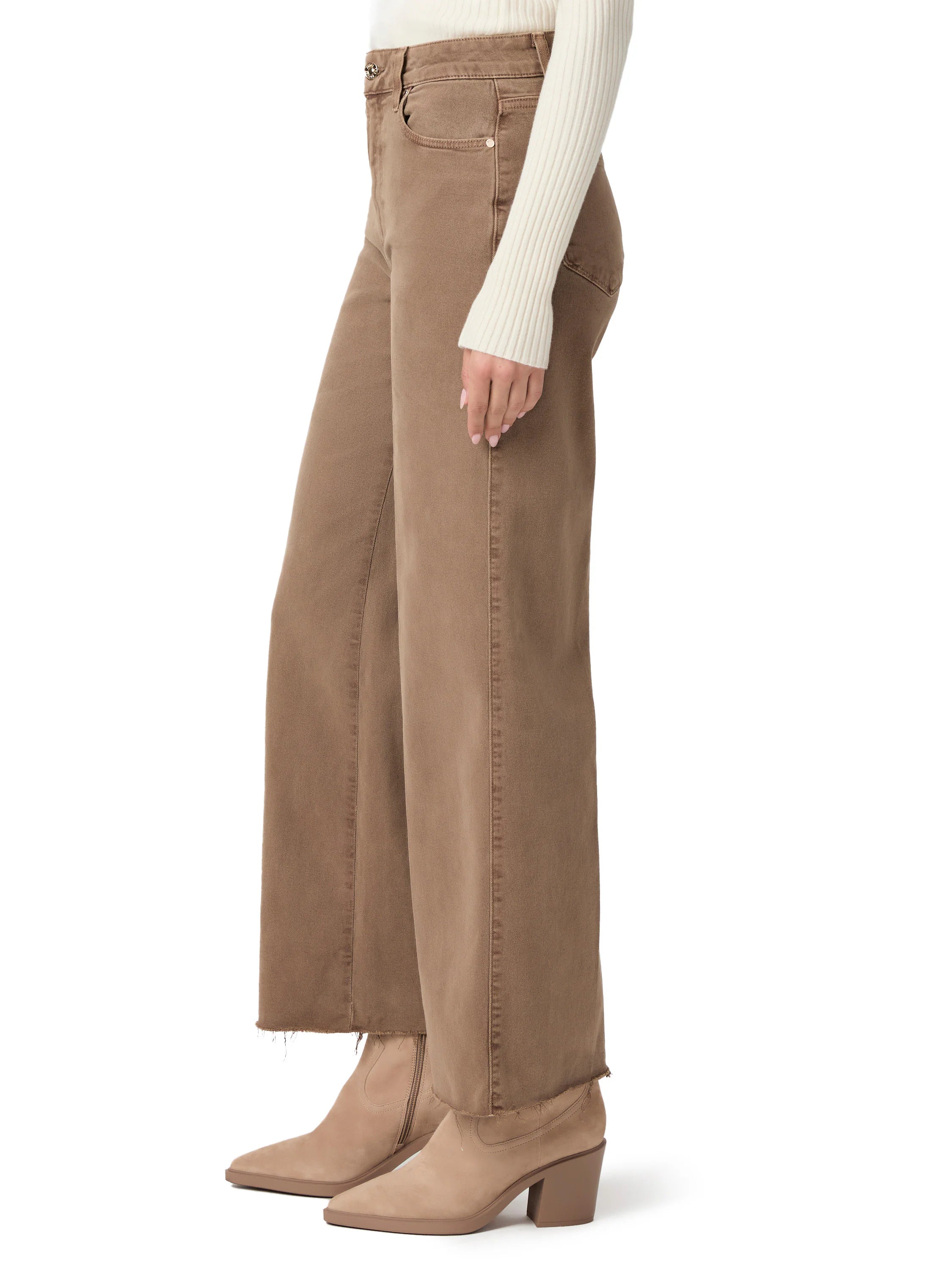 Taupe wide-leg jeans with raw hems, modeled.
