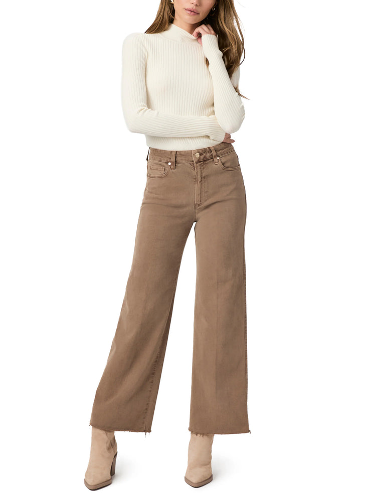 Mocha high-waisted, wide-leg jeans with a distinct raw hem, worn by a model.