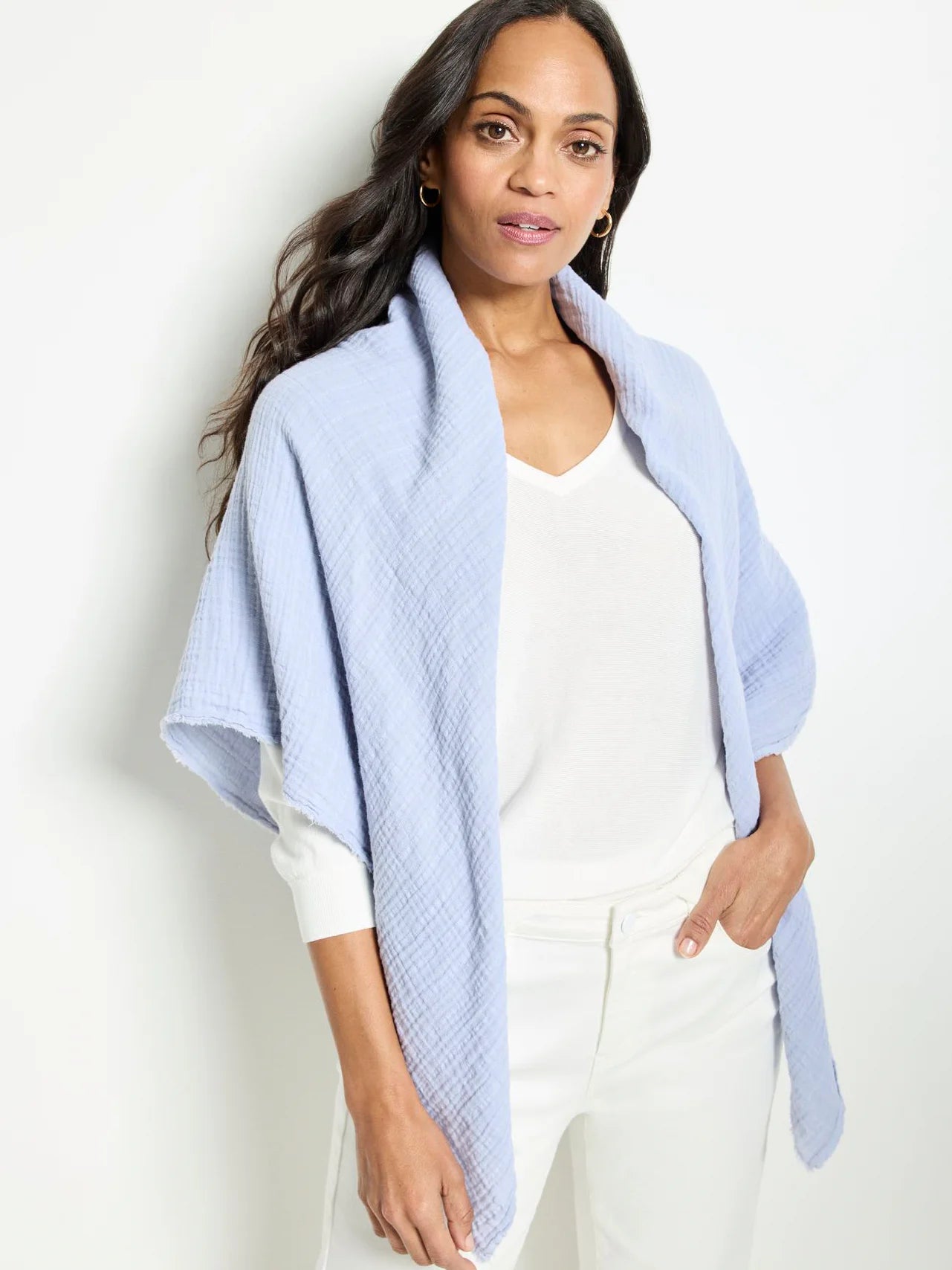 Light blue double gauze scarf; textured fabric.  Raw edges.