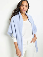 Light blue double gauze scarf; textured fabric.  Raw edges.