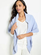 Periwinkle blue double gauze scarf;  textured fabric,  rectangular shape with raw edges.