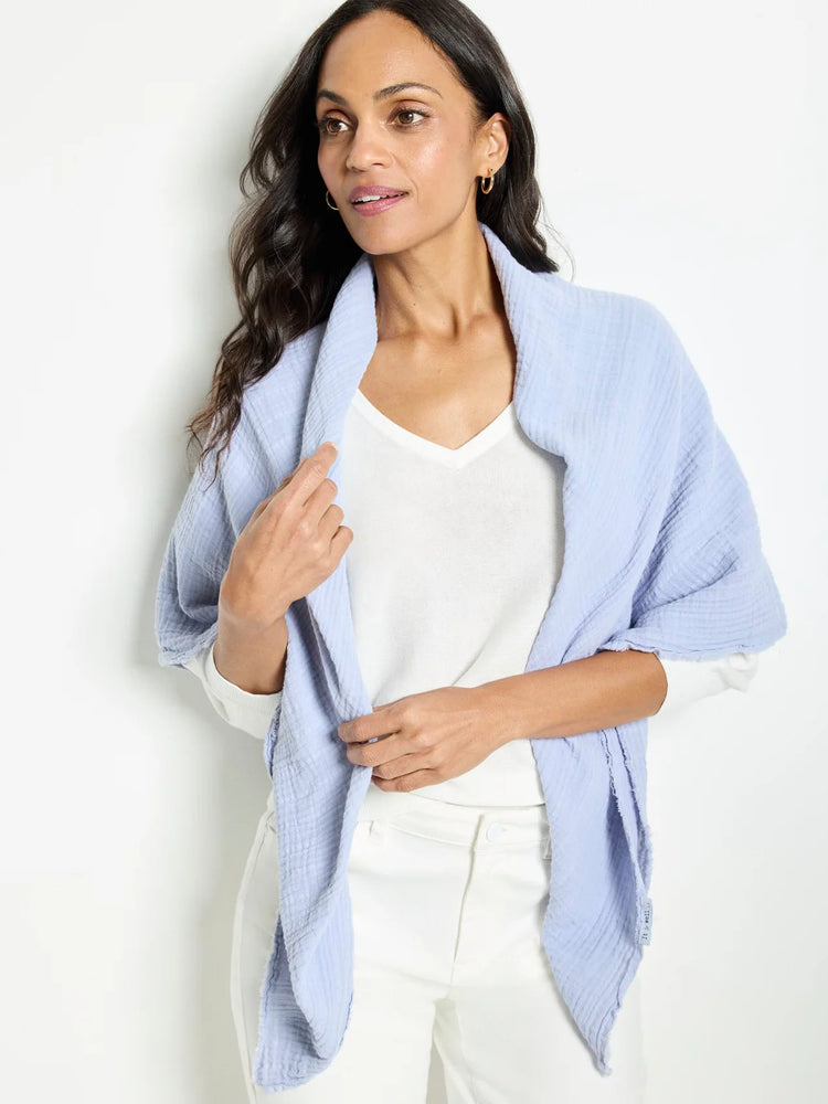 Periwinkle blue double gauze scarf;  textured fabric,  rectangular shape with raw edges.