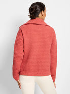 Red quilted jacket, collared, long sleeves, textured weave.