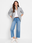 Relaxed fit cropped jacket in gray and white textured weave with a stand collar. The jacket has a full zip closure highlighted with bright green piping. [u:j7c05y]