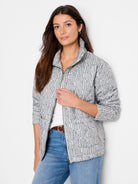 White/light grey quilted puffer jacket with dark grey abstract pattern, bright green zipper, and stand-up collar.