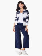 Zip-front sweater jacket; white and navy blue horizontal stripes; knit fabric.