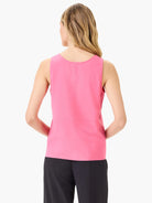 Pink sleeveless tank top, back view.  Seams visible at center back and waist.
