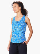 Blue tank top with white and dark blue leopard print.  Sleeveless, scoop neck.