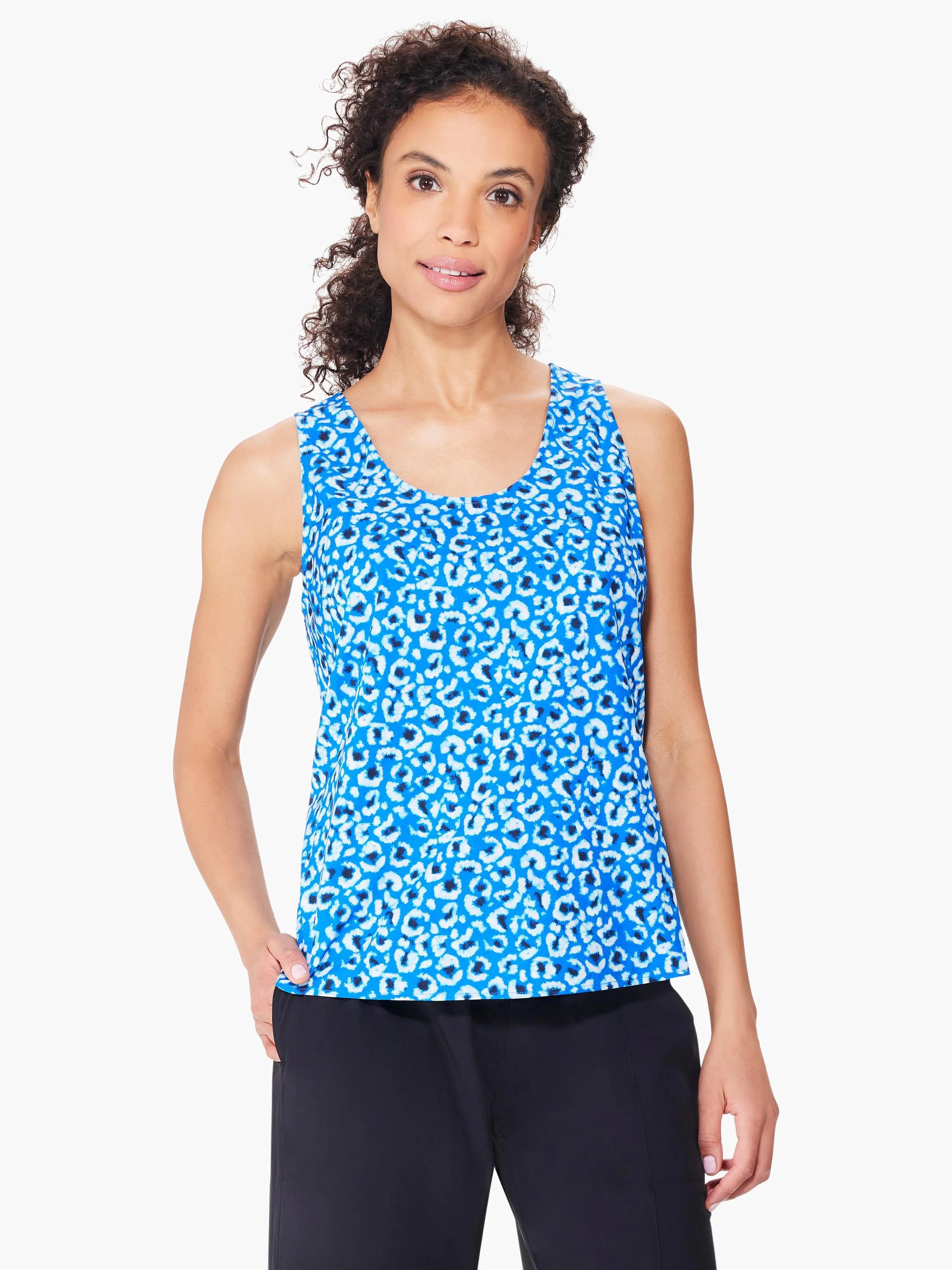 Blue sleeveless tank top with white and dark blue leopard print.