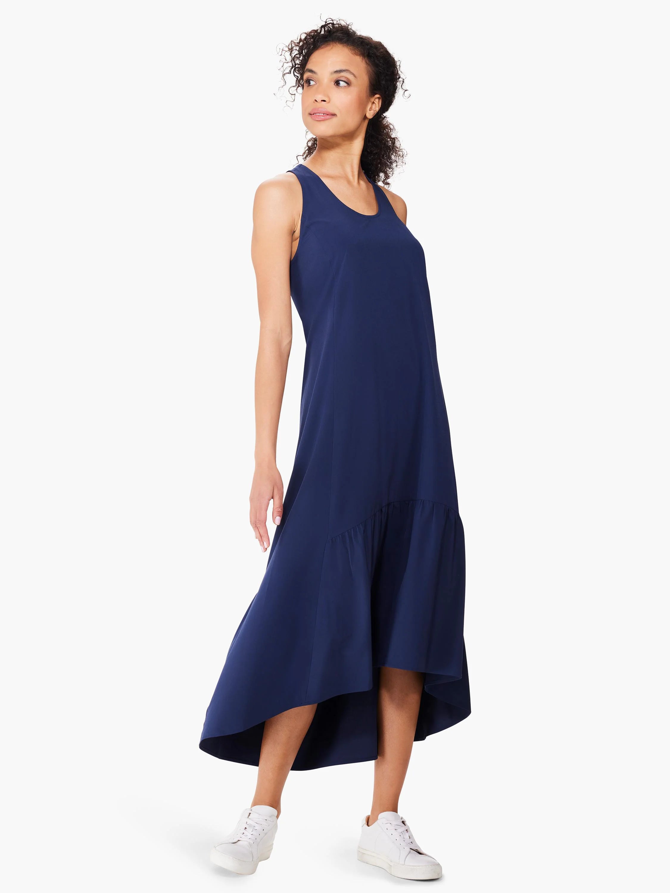 Navy blue sleeveless maxi dress; hi-lo hemline with a ruffled detail at the bottom.