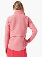 Rose-pink quilted jacket, long sleeves, mock neck.  Textured, woven pattern.