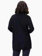 Black open-front cardigan, long sleeves, hip-length.  Model shown wearing black bottoms.