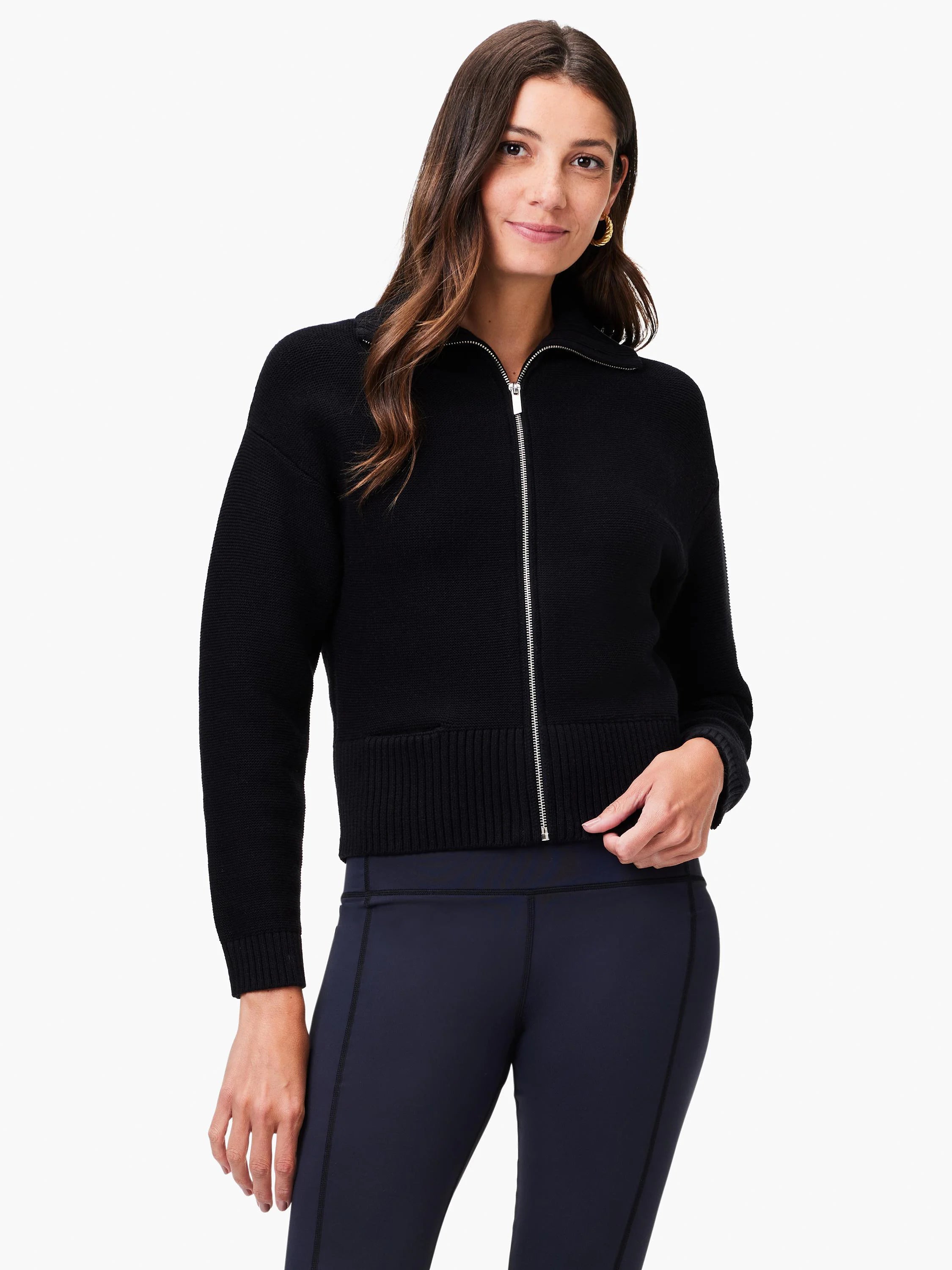 Black zip-front sweater jacket.  Ribbed details at cuffs and hem.  Silver zipper.