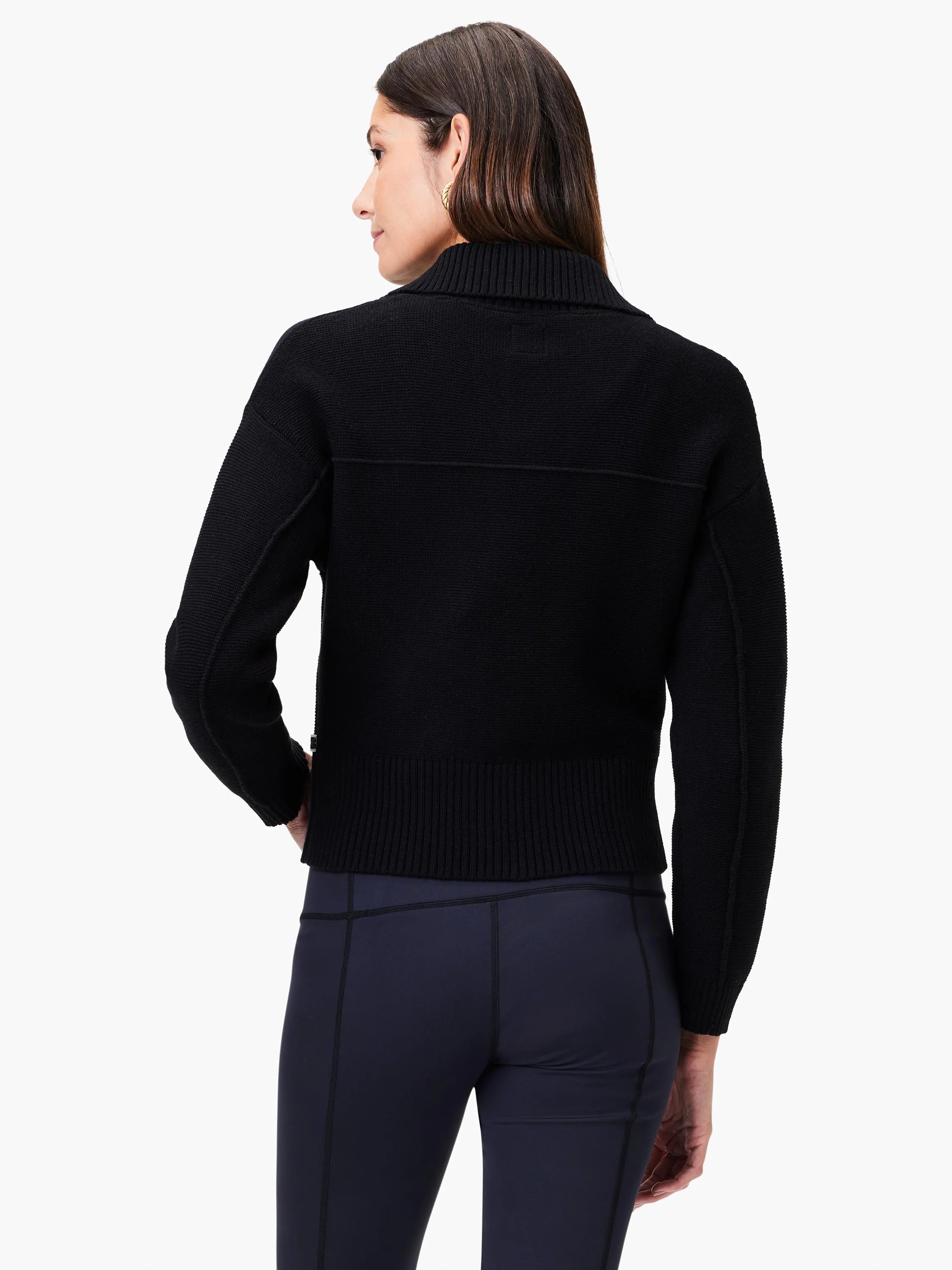 Black zip-front sweater jacket;  ribbed hem and cuffs; long sleeves.