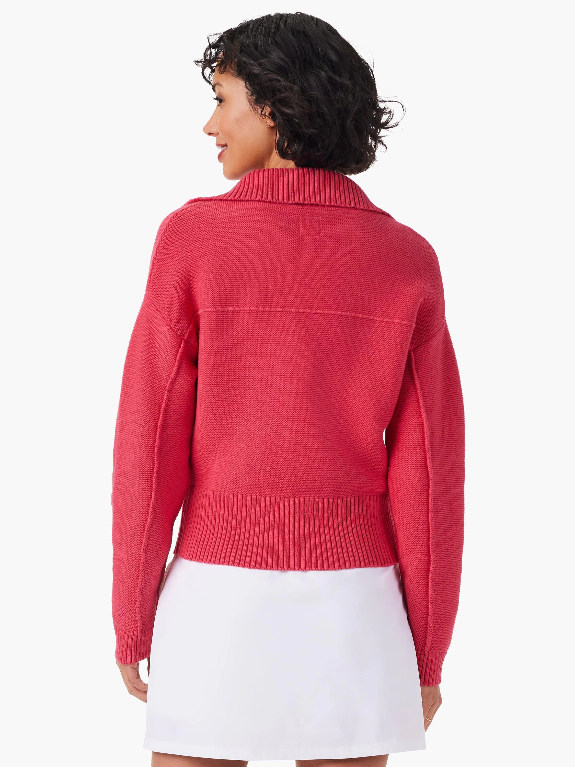 Pink zip-front sweater jacket, knit fabric, long sleeves, ribbed hem.  Back view.