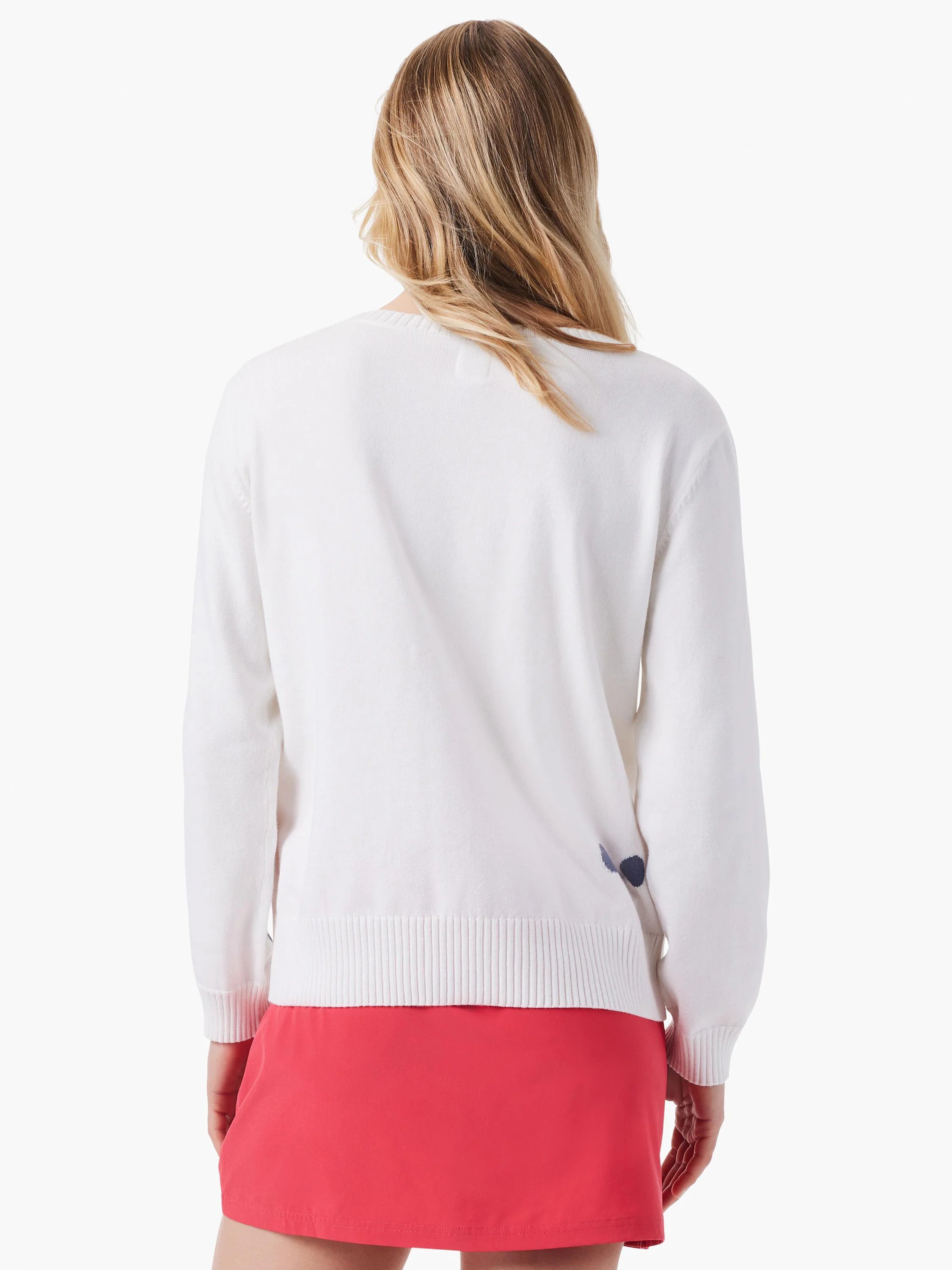 White dotted sweater with navy blue and dark gray small dots.  Long sleeves, ribbed bottom hem.