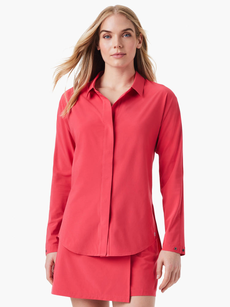 Coral long-sleeve shirt with a collar, hidden button placket, and cuffs with snap closures.