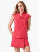 Coral-red sleeveless snap-front top and matching A-line skirt.  Dark snap closures.