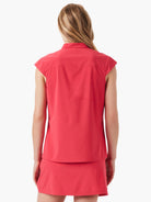 Red sleeveless snap-neck top, shown from the back.  Short hemline.