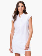 White short-sleeved collared shirt, snap closure.