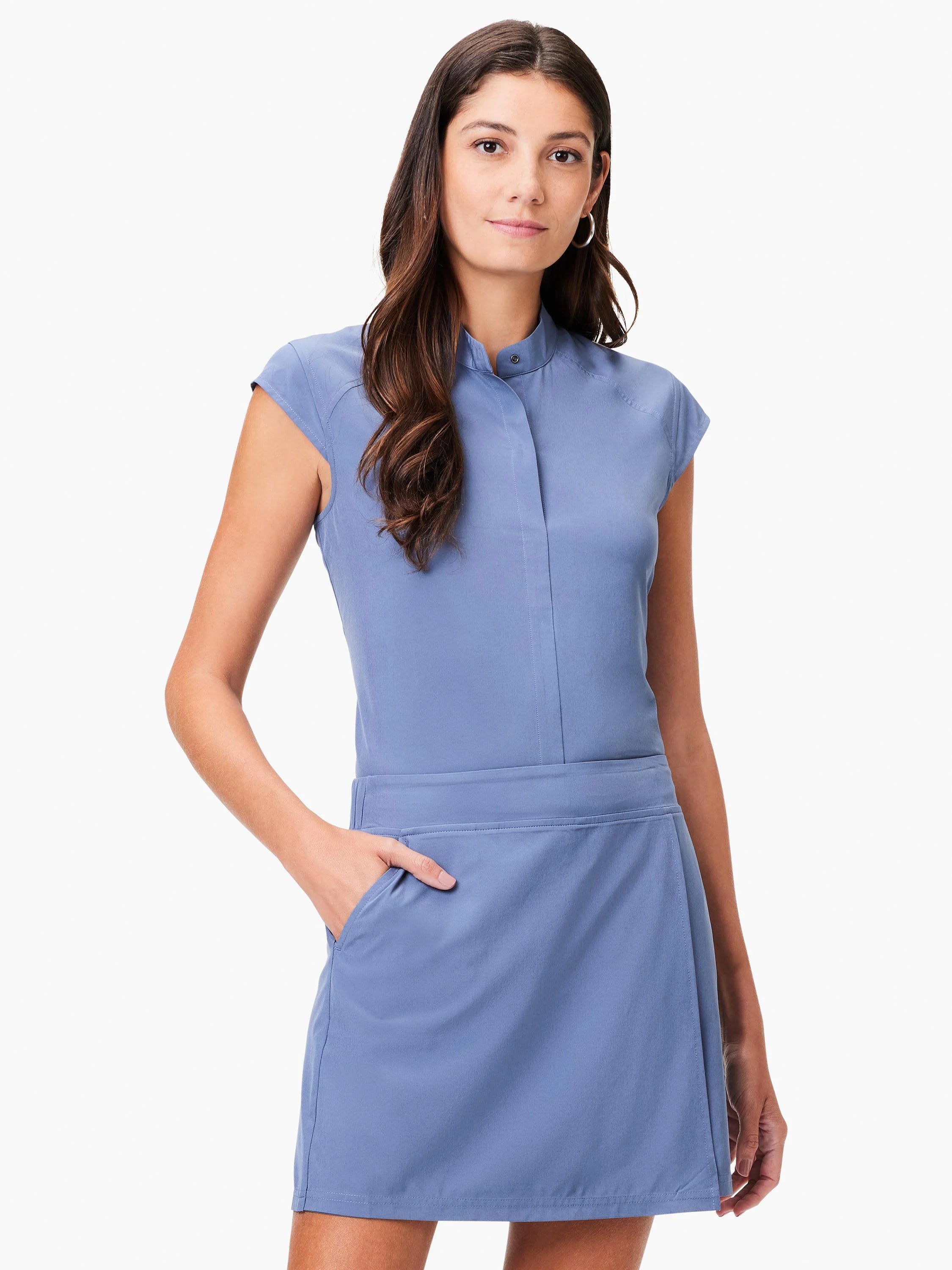 Dusty blue short-sleeved top and matching skirt. Snap front closure.  The skirt has pockets.