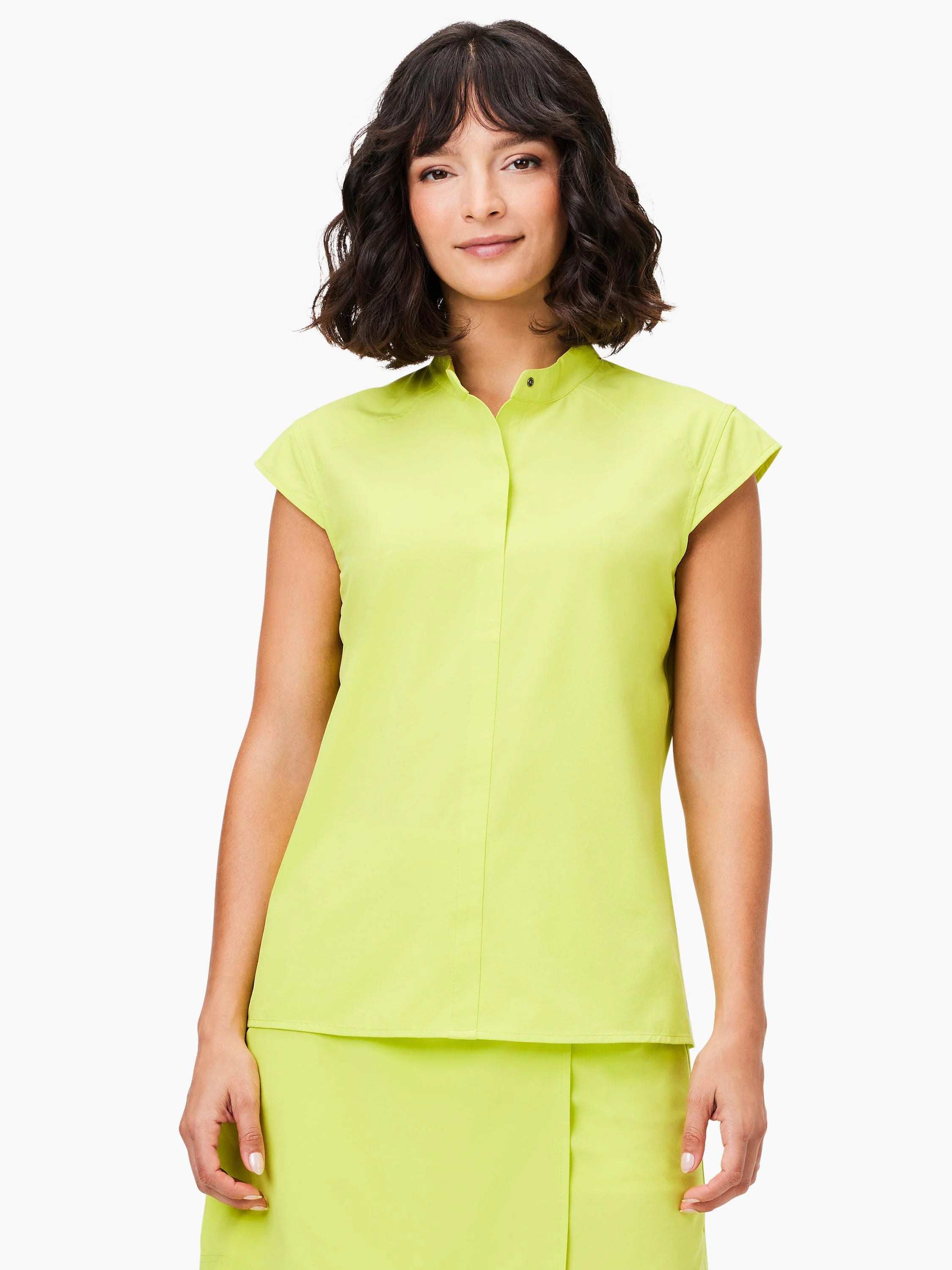 Lime green, short-sleeved, snap-front tank top.  Straight neckline.