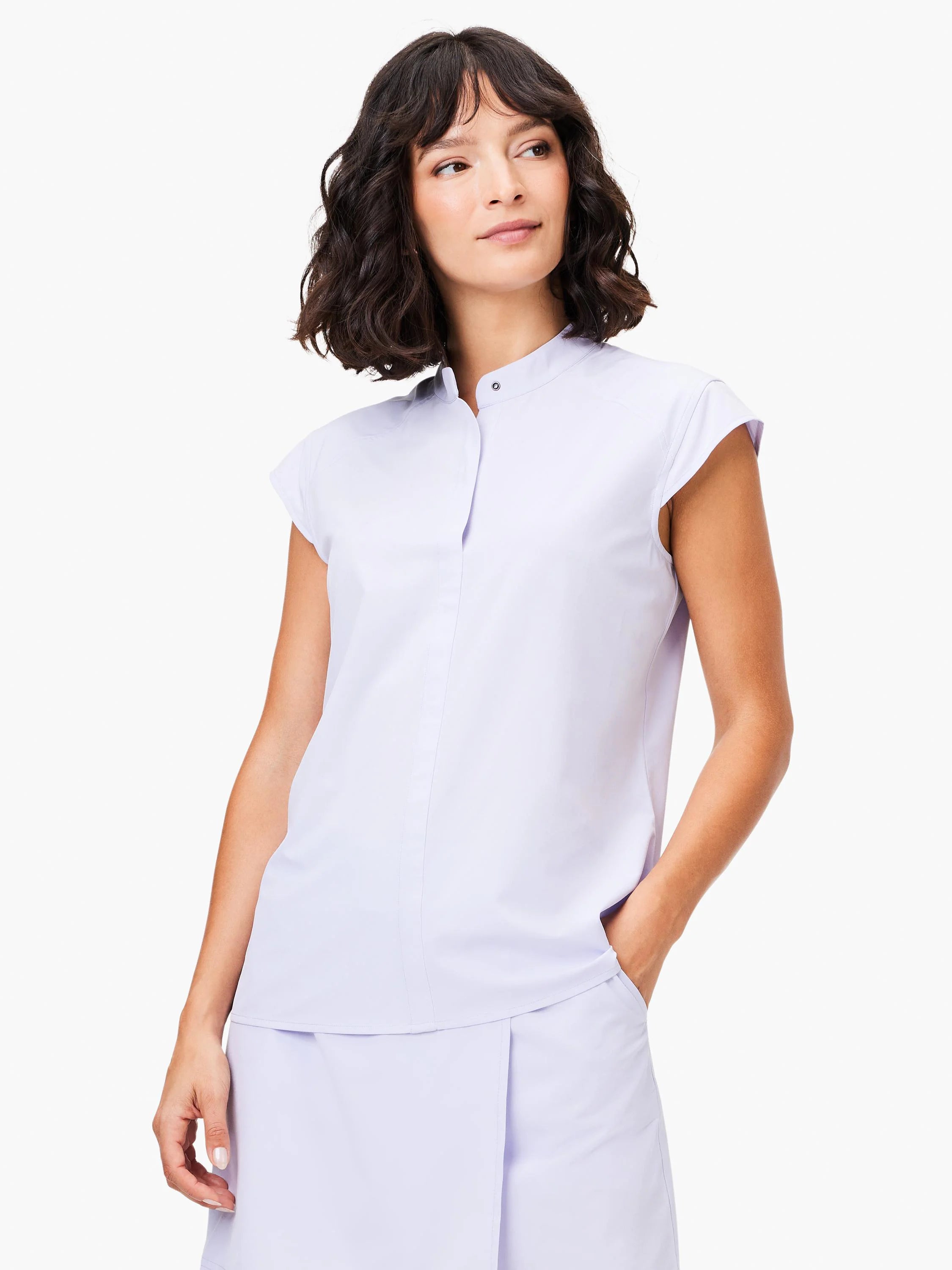 Lavender-colored, short-sleeved snap-front top.  Slight A-line shape.